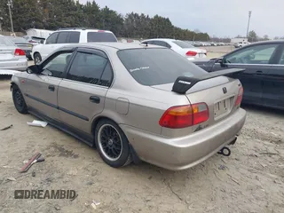 2000 Honda Civic LX with VIN 1HGEJ6672YL002709, listed as a IAAI auction lot 41680487 with 151,856 mi miles. Bid and sale history available at carsss.com. Image 3.