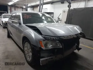 2013 Chrysler 300 with VIN 2C3CCAEG4DH691524, listed as a IAAI auction lot 41890003 with 92,228 mi miles. Bid and sale history available at carsss.com. Image 1.