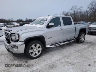 2018 GMC Sierra 1500 SLE with VIN 3GTU2MEC9JG502718, listed as a Copart auction lot 88128975 with 117,357 mi miles and Salvage Title. Bid and sale history available at carsss.com. Image 1.