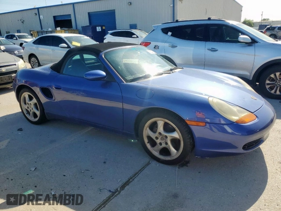 1999 Porsche Boxster z VIN WP0CA2980XU629582, wystawiony jako Copart lot #57534035 z przebiegiem 190 873 mil mil oraz Czysty tytuł • Clean title. Historia ofert i sprzedaży dostępna na DreamBid. Obrazek 4.