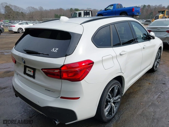 2018 BMW X1 sDrive28i with VIN WBXHU7C39J3H43185, listed as a IAAI auction lot 41798183 with 51,666 mi miles. Bid and sale history available at carsss.com. Image 4.