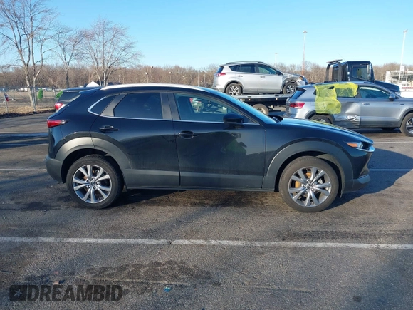 2023 Mazda CX-30 2.5 S Select Package with VIN 3MVDMBBM3PM584854, listed as a IAAI auction lot 41736925 with 39,008 mi miles. Bid and sale history available at carsss.com. Image 13.