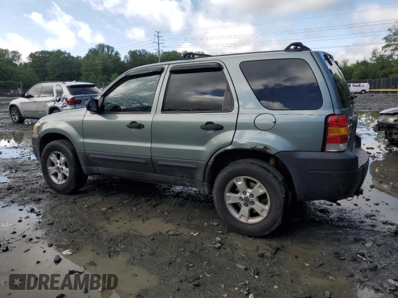 2006 Ford Escape XLT with VIN 1FMYU93146KC00081, listed as a Copart auction lot 56724835 with 243,213 mi miles and Salvage title. Bid and sale history available at DreamBid. Image 2.