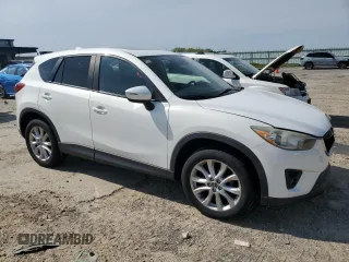 2015 Mazda CX-5 Grand Touring with VIN JM3KE4DY3F0496994, listed as a Copart auction lot 56093965 with 184,256 mi miles and Non Repairable. Bid and sale history available at DreamBid. Image 4.