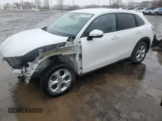 2023 Honda HR-V LX with VIN 3CZRZ1H3XPM100478, listed as a Copart auction lot 51677465 with 15,124 mi miles and Salvage title. Bid and sale history available at DreamBid. Image 1.