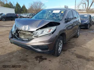 2015 Honda CR-V LX with VIN 3CZRM3H34FG707841, listed as a IAAI auction lot 41654996 with 133,894 mi miles. Bid and sale history available at carsss.com. Image 2.