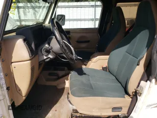 2001 Jeep Wrangler Sahara with VIN 1J4FA59SX1P338887, listed as a Copart auction lot 72835514 with 0 mi miles and Salvage Title. Bid and sale history available at carsss.com. Image 7.