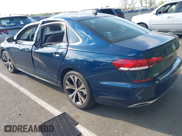 2021 Volkswagen Passat SE with VIN 1VWSA7A36MC010749, listed as a IAAI auction lot 42141065 with 43,571 mi miles and . Bid and sale history available at DreamBid. Image 3.