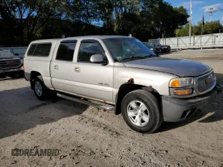 2006 GMC Sierra Denali z VIN 2GTEK63N561179546, wystawiony jako Copart lot #75612644 z przebiegiem 198 696 mil mil oraz Tytuł czysty. Historia ofert i sprzedaży dostępna na DreamBid. Obrazek 4.