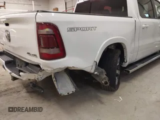 2021 Ram 1500 Laramie with VIN 1C6SRFJT6MN671456, listed as a IAAI auction lot 41087757 with 40,593 mi miles and . Bid and sale history available at DreamBid. Image 6.
