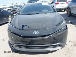 2023 Toyota Prius LE with VIN JTDACAAUXP3008201, listed as a IAAI auction lot 41824469 with 27,864 mi miles and . Bid and sale history available at carsss.com. Image 12.