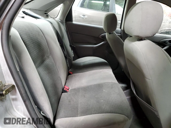 2003 Ford Focus LX z VIN 1FAFP33P03W313279, wystawiony jako Copart lot #89271495 z przebiegiem 152 672 mil mil oraz Szkoda całkowita • Salvage title. Historia ofert i sprzedaży dostępna na DreamBid. Obrazek 10.