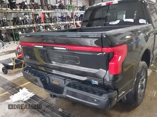 2023 Ford F-150 Lightning Pro with VIN 1FTVW1EV5PWG59228, listed as a IAAI auction lot 40838790 with Not Provided miles and . Bid and sale history available at DreamBid. Image 17.