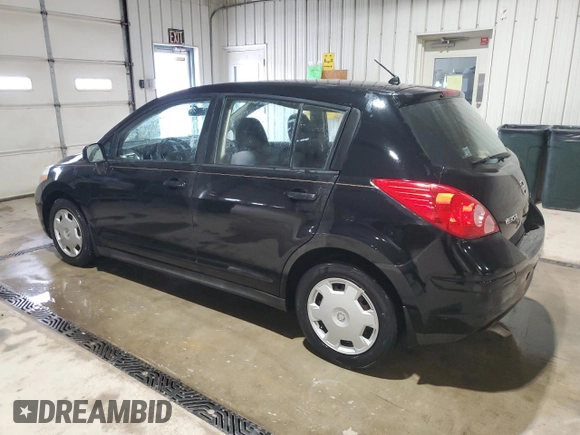 2007 Nissan Versa 1.8 S with VIN 3N1BC13E87L409263, listed as a Copart auction lot 53565105 with 124,860 mi miles and Salvage Title. Bid and sale history available at carsss.com. Image 2.