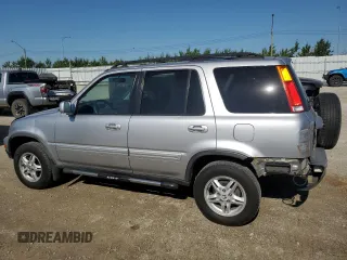2001 Honda CR-V SE with VIN JHLRD18761C809752, listed as a Copart auction lot 63261514 with 211,018 mi miles and Salvage Title. Bid and sale history available at carsss.com. Image 2.