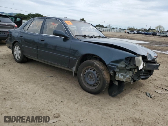 1994 Toyota Camry LE z VIN JT2GK12E2R0039606, wystawiony jako Copart lot #49840015 z przebiegiem 197 834 mil mil oraz Szkoda całkowita • Salvage title. Historia ofert i sprzedaży dostępna na DreamBid. Obrazek 4.