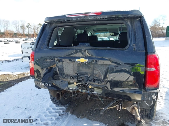 2019 Chevrolet Tahoe LT with VIN 1GNSKBKC7KR138999, listed as a IAAI auction lot 41339420 with 74,297 mi miles. Bid and sale history available at carsss.com. Image 16.