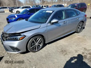 2024 Honda Civic Sedan Touring with VIN 2HGFE1F95RH325566, listed as a Copart auction lot 51640455 with 7,127 mi miles and Salvage Title. Bid and sale history available at carsss.com. Image 1.