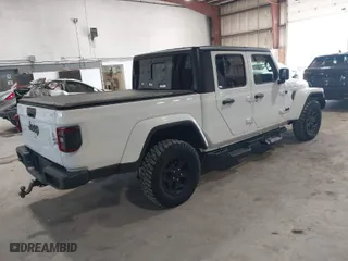 2021 Jeep Gladiator Texas Trail with VIN 1C6HJTAG3ML548261, listed as a IAAI auction lot 41791595 with 34,582 mi miles. Bid and sale history available at carsss.com. Image 4.