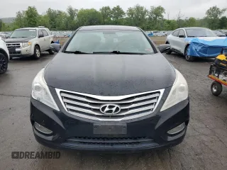 2013 Hyundai Azera z VIN KMHFG4JG2DA224164, wystawiony jako Copart lot #58184245 z przebiegiem 206 811 mil mil oraz Czysty tytuł • Clean title. Historia ofert i sprzedaży dostępna na DreamBid. Obrazek 5.