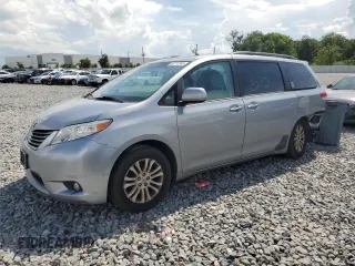 2011 Toyota Sienna XLE AAS with VIN 5TDYK3DC5BS085808, listed as a Copart auction lot 62717245 with 118,012 mi miles and Salvage title. Bid and sale history available at DreamBid. Image 1.