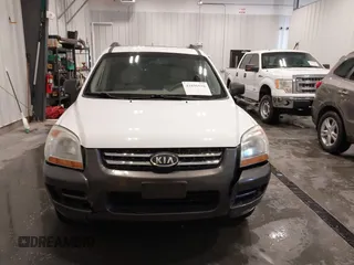 2007 Kia Sportage LX with VIN KNDJF724877399530, listed as a IAAI auction lot 41696698 with 124,967 mi miles. Bid and sale history available at carsss.com. Image 12.