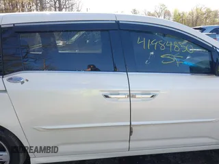 2012 Honda Odyssey Touring with VIN 5FNRL5H93CB146753, listed as a IAAI auction lot 41984850 with 155,309 mi miles and . Bid and sale history available at DreamBid. Image 13.