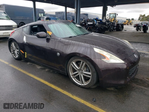 2010 Nissan 370Z Touring with VIN JN1AZ4EH6AM504310, listed as a Copart auction lot 82440524 with Not Provided miles and Salvage Title. Bid and sale history available at carsss.com. Image 4.
