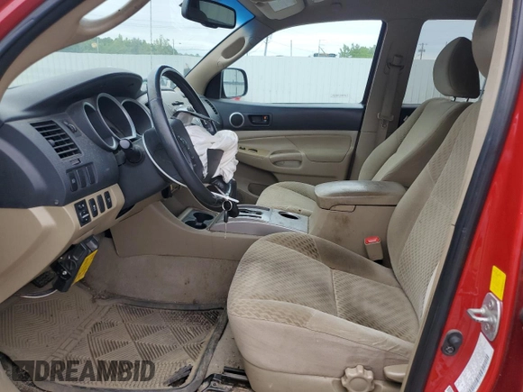 2011 Toyota Tacoma with VIN 3TMLU4EN4BM063860, listed as a Copart auction lot 62461725 with 144,642 mi miles and Salvage title. Bid and sale history available at DreamBid. Image 7.