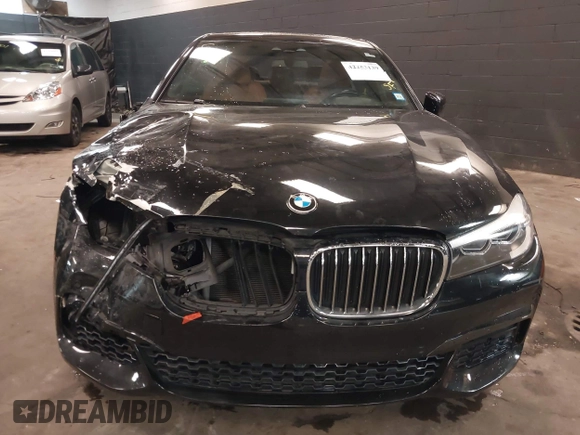 2018 BMW 7 Series 740i xDrive z VIN WBA7E4C51JGV24133, wystawiony jako IAAI lot #42253139 z przebiegiem 77 370 mil mil oraz . Historia ofert i sprzedaży dostępna na DreamBid. Obrazek 12.