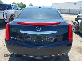 2013 Cadillac XTS Luxury z VIN 2G61R5S32D9226506, wystawiony jako IAAI lot #42208105 z przebiegiem 140 255 mil mil oraz . Historia ofert i sprzedaży dostępna na DreamBid. Obrazek 16.