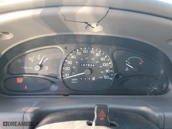 1999 Ford Escort LX with VIN 1FAFP10P5XW277376, listed as a Copart auction lot 82148204 with 127,634 mi miles and Salvage Title. Bid and sale history available at carsss.com. Image 9.