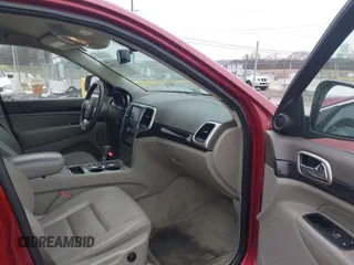 2013 Jeep Grand Cherokee Laredo with VIN 1C4RJEAG4DC573971, listed as a IAAI auction lot 41627288 with 143,256 mi miles. Bid and sale history available at carsss.com. Image 5.