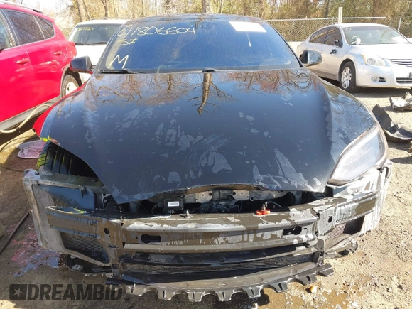 2014 Tesla Model S 60 with VIN 5YJSA1H1XEFP34226, listed as a IAAI auction lot 41806604 with 216,021 mi miles and . Bid and sale history available at DreamBid. Image 12.