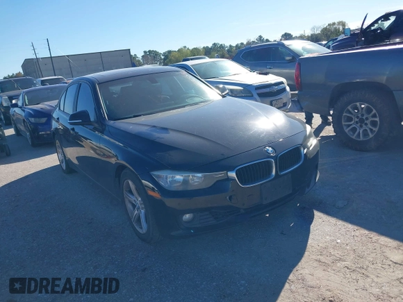 2015 BMW 3 Series 328i with VIN WBA3A5C55FF608159, listed as a IAAI auction lot 41255978 with 199,024 mi miles. Bid and sale history available at carsss.com. Image 1.