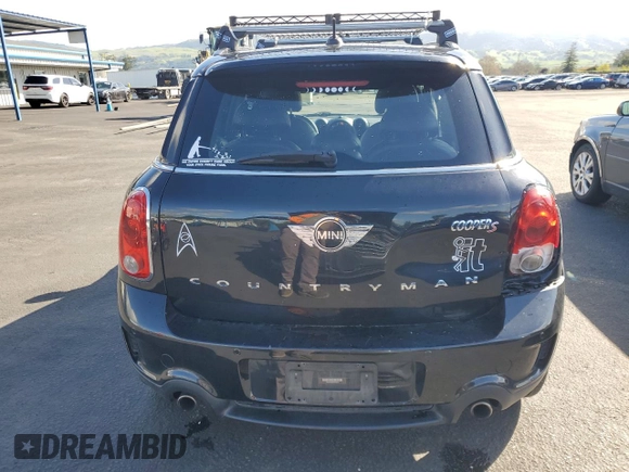 2016 MINI Countryman S with VIN WMWZC3C54GWT08932, listed as a Copart auction lot 51185955 with 101,023 mi miles and Salvage Title. Bid and sale history available at DreamBid. Image 6.