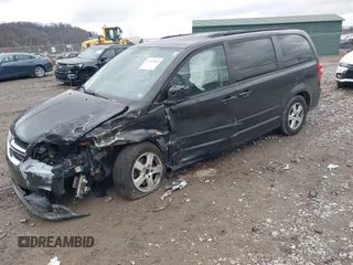 2012 Dodge Grand Caravan SXT with VIN 2C4RDGCG8CR242235, listed as a IAAI auction lot 41922083 with 124,306 mi miles and . Bid and sale history available at DreamBid. Image 17.