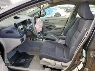 2010 Honda Insight EX z VIN JHMZE2H72AS038002, wystawiony jako Copart lot #58484365 z przebiegiem 178 670 mil mil oraz Szkoda całkowita • Salvage title. Historia ofert i sprzedaży dostępna na DreamBid. Obrazek 7.