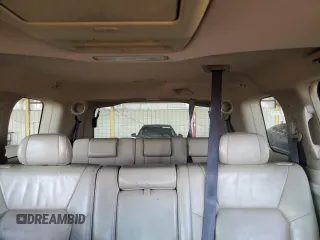 2009 Honda Pilot EX-L with VIN 5FNYF48609B017784, listed as a Copart auction lot 51204395 with 221,801 mi miles and Salvage Title. Bid and sale history available at carsss.com. Image 10.