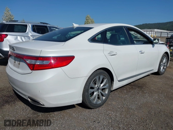 2014 Hyundai Azera with VIN KMHFG4JGXEA345249, listed as a IAAI auction lot 42118221 with 66,567 mi miles and . Bid and sale history available at carsss.com. Image 4.