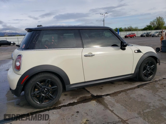 2012 MINI Hardtop with VIN WMWSU3C51CT186184, listed as a Copart auction lot 55090935 with 100,669 mi miles and Salvage Title. Bid and sale history available at DreamBid. Image 3.