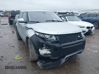2015 Land Rover Range Rover Evoque Pure Premium z VIN SALVR2BG6FH070994, wystawiony jako IAAI lot #41536880 z przebiegiem 59 173 mil mil oraz . Historia ofert i sprzedaży dostępna na DreamBid. Obrazek 1.