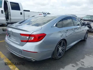 2020 Honda Accord Touring with VIN 1HGCV2F96LA018714, listed as a IAAI auction lot 42084295 with 74,861 mi miles and . Bid and sale history available at DreamBid. Image 4.