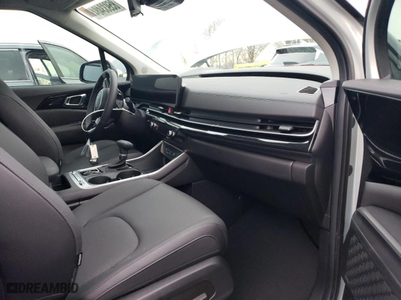 2025 Kia Carnival SX with VIN KNDNE5K32S6469053, listed as a Copart auction lot 85933484 with 0 mi miles and Salvage Title. Bid and sale history available at carsss.com. Image 8.