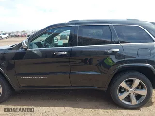 2014 Jeep Grand Cherokee Overland with VIN 1C4RJFCG4EC273786, listed as a IAAI auction lot 41901304 with 73,055 mi miles. Bid and sale history available at carsss.com. Image 14.