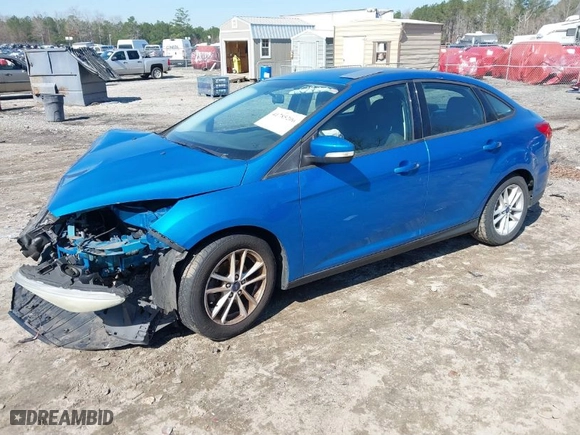 2015 Ford Focus SE with VIN 1FADP3F25FL200831, listed as a IAAI auction lot 41785206 with 141,139 mi miles. Bid and sale history available at carsss.com. Image 2.