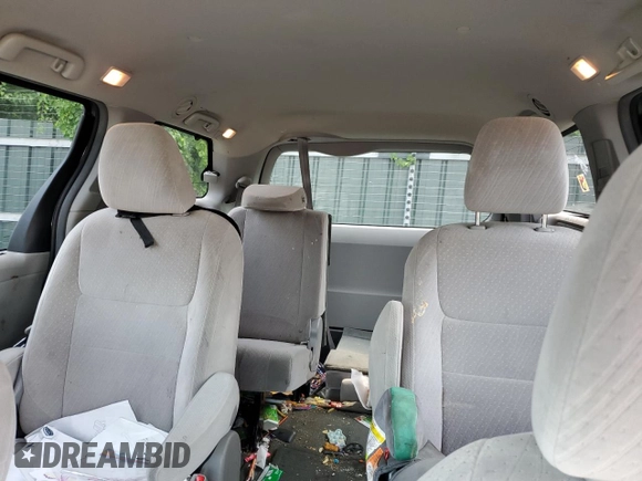 2016 Toyota Sienna LE with VIN 5TDJK3DC3GS134674, listed as a Copart auction lot 67357104 with 105,079 mi miles and Salvage Title. Bid and sale history available at carsss.com. Image 10.