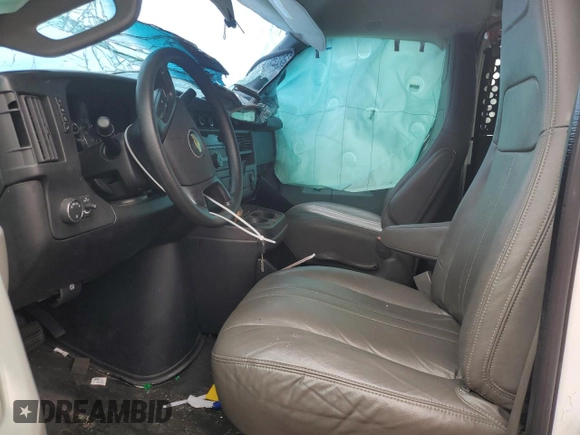 2016 Chevrolet Express Cargo with VIN 1GCWGAFF1G1124774, listed as a Copart auction lot 83574214 with 270,050 mi miles and Salvage title. Bid and sale history available at DreamBid. Image 7.