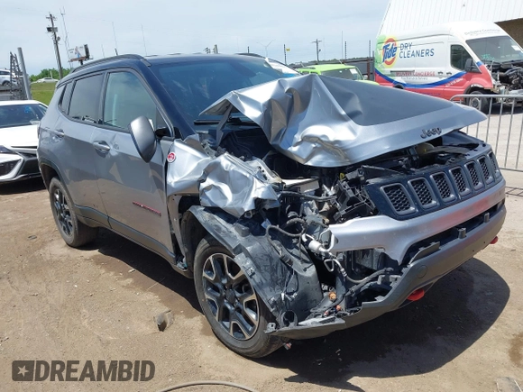 2020 Jeep Compass Trailhawk with VIN 3C4NJDDB7LT159532, listed as a IAAI auction lot 42243833 with 118,566 mi miles and . Bid and sale history available at DreamBid. Image 1.