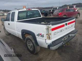 2005 Chevrolet Silverado 1500 with VIN 1GCEK19V65E152928, listed as a IAAI auction lot 41485115 with 165,560 mi miles. Bid and sale history available at carsss.com. Image 3.